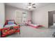 room with themed beds, carpeted floors, and a bright, cheerful atmosphere at 3574 N Druid Hills Rd, Decatur, GA 30033