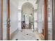 Grand foyer with high ceilings and elegant tile flooring at 3574 N Druid Hills Rd, Decatur, GA 30033