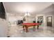 Large game room featuring a pool table and ample entertaining space at 3574 N Druid Hills Rd, Decatur, GA 30033