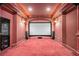 Home theater with a large screen and carpet, perfect for movie nights at 3574 N Druid Hills Rd, Decatur, GA 30033