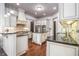 Gourmet kitchen featuring stainless steel appliances, granite countertops and custom cabinetry at 3574 N Druid Hills Rd, Decatur, GA 30033