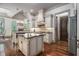 Gourmet kitchen with custom cabinets, granite countertops, and stainless steel appliances at 3574 N Druid Hills Rd, Decatur, GA 30033