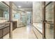 Luxurious main bathroom with glass shower, soaking tub, and dual vanity at 3574 N Druid Hills Rd, Decatur, GA 30033