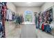 Spacious walk-in closet with an island and abundant hanging space at 3574 N Druid Hills Rd, Decatur, GA 30033