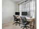Bright office space with dual desks and large window, perfect for remote work at 1233 Miss Irene Ln, Lawrenceville, GA 30044