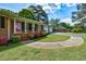 Traditional brick ranch with well-maintained landscaping and covered front entrance at 241 Burke Cir, Mcdonough, GA 30253