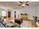 Spacious living room boasting hardwood floors and an open floor plan, providing ample space and natural light at 241 Burke Cir, Mcdonough, GA 30253