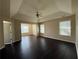 Spacious main bedroom featuring hardwood floors, multiple windows, and ample natural light at 4500 Nocohoma Bnd, Douglasville, GA 30135