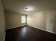Bedroom featuring laminate flooring and natural light from a window at 4500 Nocohoma Bnd, Douglasville, GA 30135