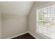 Walk in closet with hardwood floors and a window for natural light at 4500 Nocohoma Bnd, Douglasville, GA 30135