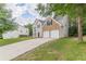 A lovely two-story home with a brick-accented facade and a two-car garage at 4500 Nocohoma Bnd, Douglasville, GA 30135