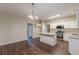 Eat-in kitchen has granite island and countertops, stainless appliances and hardwood floors at 4500 Nocohoma Bnd, Douglasville, GA 30135
