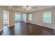 Main bedroom with hardwood floors, ensuite bathroom, and natural light at 4500 Nocohoma Bnd, Douglasville, GA 30135