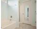 Bright bathroom with a shower and tub combination at 1265 Birchwood Ln, Roswell, GA 30076