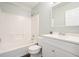 Updated bathroom featuring a shower/tub combo, toilet, and vanity with a mirror at 1265 Birchwood Ln, Roswell, GA 30076