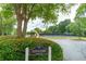 A view of the Crabapple Swim & Tennis Community Association and tennis court at 1265 Birchwood Ln, Roswell, GA 30076