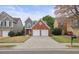 Charming home with a brick and siding exterior, two-car garage, and a well-manicured front lawn at 1265 Birchwood Ln, Roswell, GA 30076