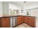 Updated kitchen with a breakfast bar area, perfect for casual dining and entertaining at 1265 Birchwood Ln, Roswell, GA 30076