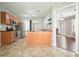 Bright kitchen featuring stainless steel appliances, breakfast bar, and an open floor plan at 1265 Birchwood Ln, Roswell, GA 30076
