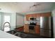 Bright kitchen with stainless steel appliances and lots of cabinets at 1265 Birchwood Ln, Roswell, GA 30076