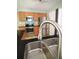 Kitchen featuring stainless steel appliances, lots of storage and a faucet at 1265 Birchwood Ln, Roswell, GA 30076
