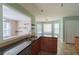Spacious kitchen with stainless steel appliances, black countertop and bay window seating at 1265 Birchwood Ln, Roswell, GA 30076
