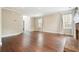 Bright living room with hardwood floors, fireplace, and neutral wall paint at 1265 Birchwood Ln, Roswell, GA 30076