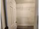 Walk-in closet with white walls, wire shelving and wood-look flooring at 263 Northwind Dr, Stockbridge, GA 30281
