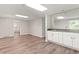 Basement bar area with cabinets and a sink at 3183 Robinwood Trl, Decatur, GA 30034