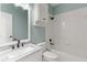 Bathroom with updated vanity, tiled shower, and modern fixtures at 3183 Robinwood Trl, Decatur, GA 30034