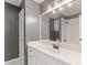 Bathroom with white countertop and a large mirror at 3183 Robinwood Trl, Decatur, GA 30034