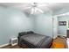 Bedroom with a ceiling fan and view of backyard at 3183 Robinwood Trl, Decatur, GA 30034