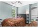 Bedroom with a ceiling fan and view of backyard at 3183 Robinwood Trl, Decatur, GA 30034