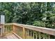 A beautiful wooden deck overlooks a lush green backyard at 3183 Robinwood Trl, Decatur, GA 30034