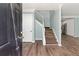 Inviting entryway with updated floors and staircase at 3183 Robinwood Trl, Decatur, GA 30034