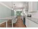Bright kitchen featuring a center island with granite countertops at 3183 Robinwood Trl, Decatur, GA 30034