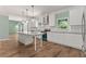 Modern kitchen featuring a large center island, granite countertops, and stainless steel appliances at 3183 Robinwood Trl, Decatur, GA 30034