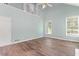 Living area featuring vaulted ceilings, hardwood floors, and ample natural light at 3183 Robinwood Trl, Decatur, GA 30034