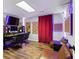 Music room with sound panels, recording equipment, and wood floors at 3183 Robinwood Trl, Decatur, GA 30034