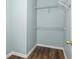 Small walk-in closet with vinyl floors at 3183 Robinwood Trl, Decatur, GA 30034