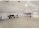 Large and versatile bonus room perfect for recreation or storage with neutral carpeting at 3380 E Wood Valley Rd, Atlanta, GA 30327