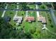Overhead photo captures multiple residences, showcasing the neighborhood and surrounding greenery at 4164 Weston Dr, Powder Springs, GA 30127