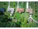 Aerial view featuring neighboring houses, large lots, and tree coverage at 4164 Weston Dr, Powder Springs, GA 30127