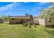 View of backyard, deck, and landscaping at 4164 Weston Dr, Powder Springs, GA 30127