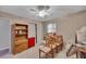 Bright bedroom with a ceiling fan and cluttered furniture at 4164 Weston Dr, Powder Springs, GA 30127