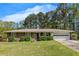 Charming brick home with a well-manicured front yard and a two-car garage at 4164 Weston Dr, Powder Springs, GA 30127