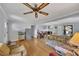 Bright living room features hardwood floors, fireplace, sliding doors, and an open layout at 4164 Weston Dr, Powder Springs, GA 30127