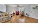 Inviting living room featuring hardwood floors, natural light, and a cozy seating area with accent chairs at 4164 Weston Dr, Powder Springs, GA 30127
