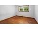 Bedroom features hardwood floors and a window that provides lots of natural light at 2307 Woodridge Dr, Marietta, GA 30066