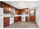 Charming kitchen featuring wooden cabinets and ample counter space at 2307 Woodridge Dr, Marietta, GA 30066